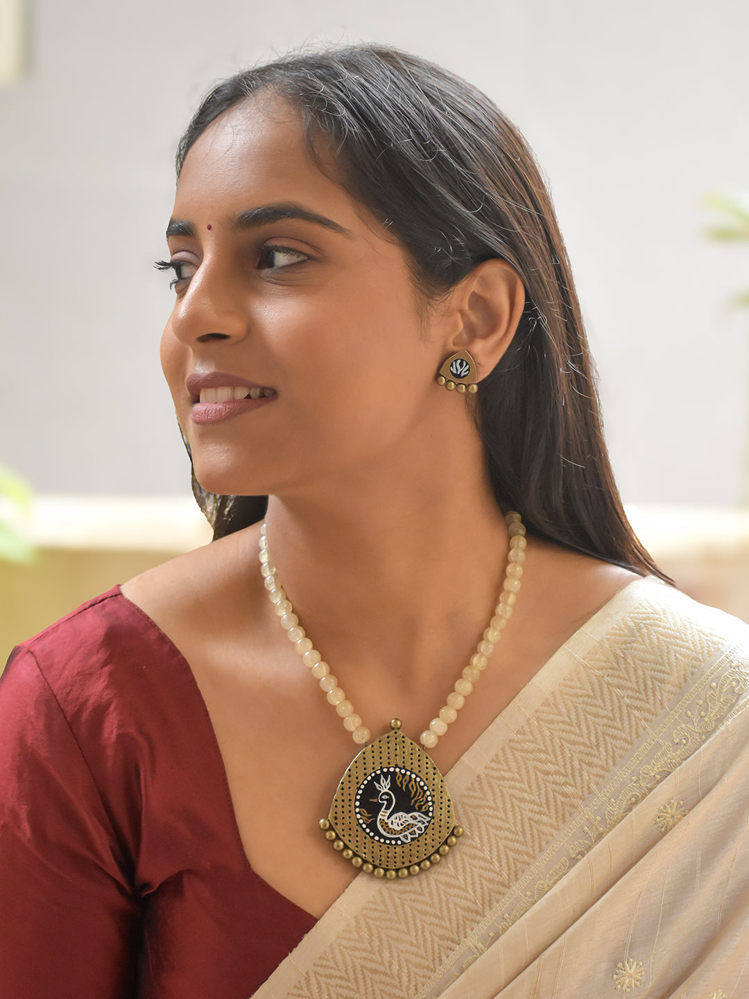 Handcrafted Terracotta Peacock Pendant Necklace Set with Cream Beads and Stud Earrings