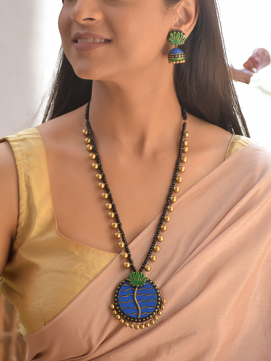 Terracotta Blue Circular Pendant Necklace with Lotus and Wave Motif