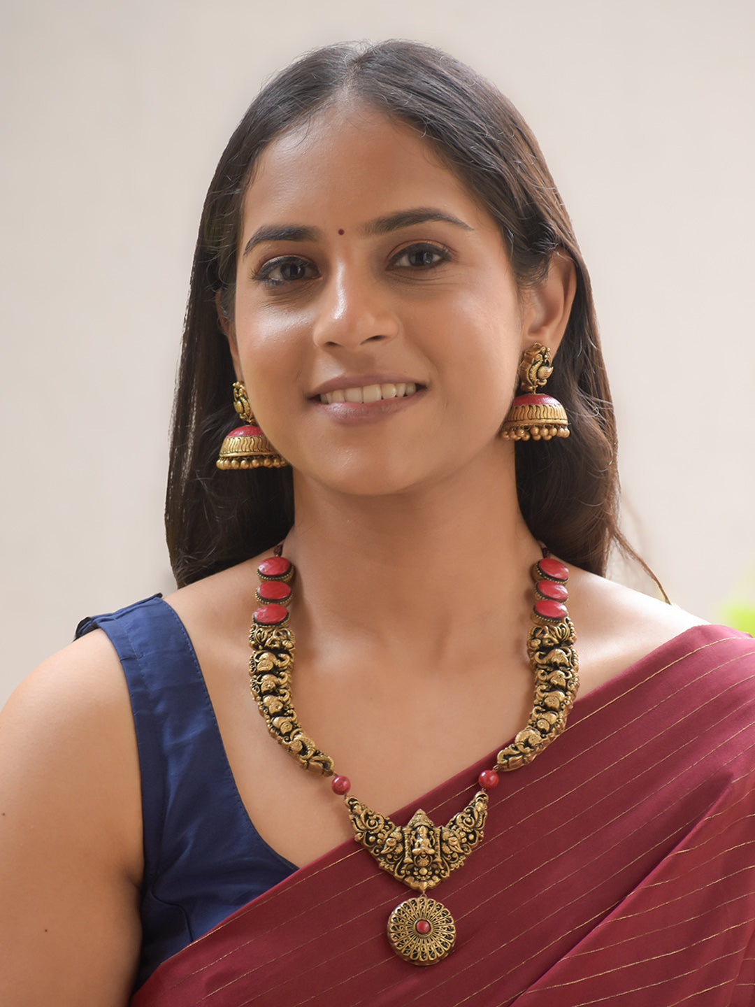 Rajapadma - Handcrafted Terracotta Temple Necklace Set with Lakshmi Motif and Antique Gold Finish and Red color Earrings