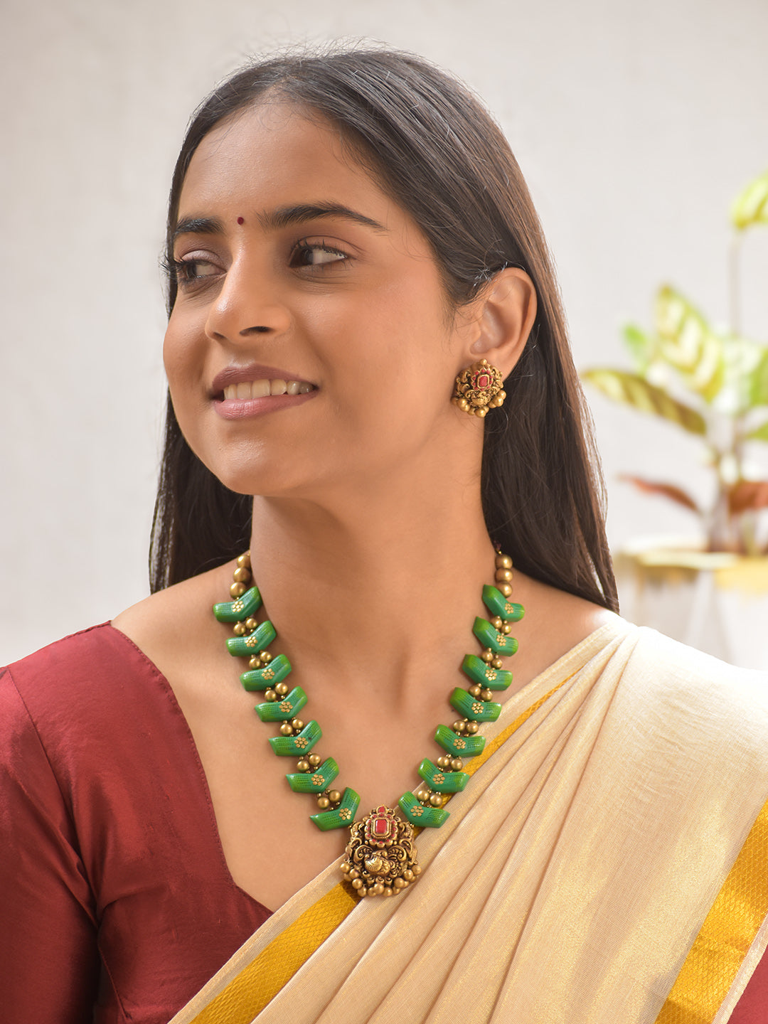 Terracotta Green Beaded Necklace Set with Antique Peacock Pendant