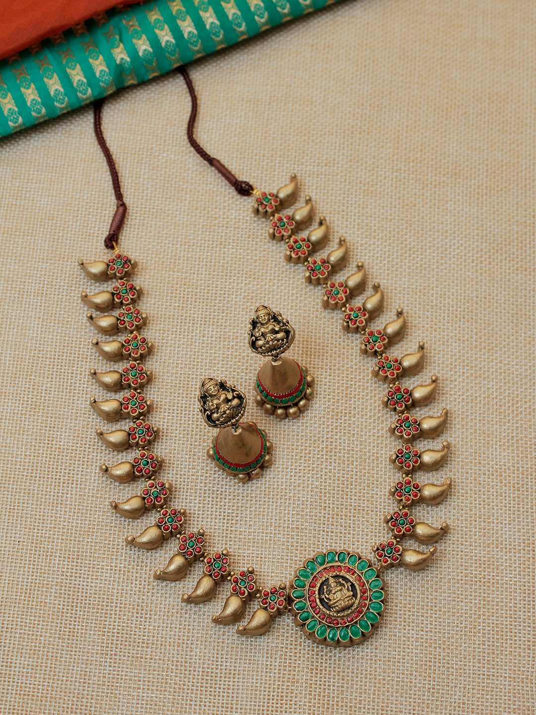 Beautifully Handmade Green & Red Lakshmi Pendant Terracotta Jewellery Set in Antique Gold