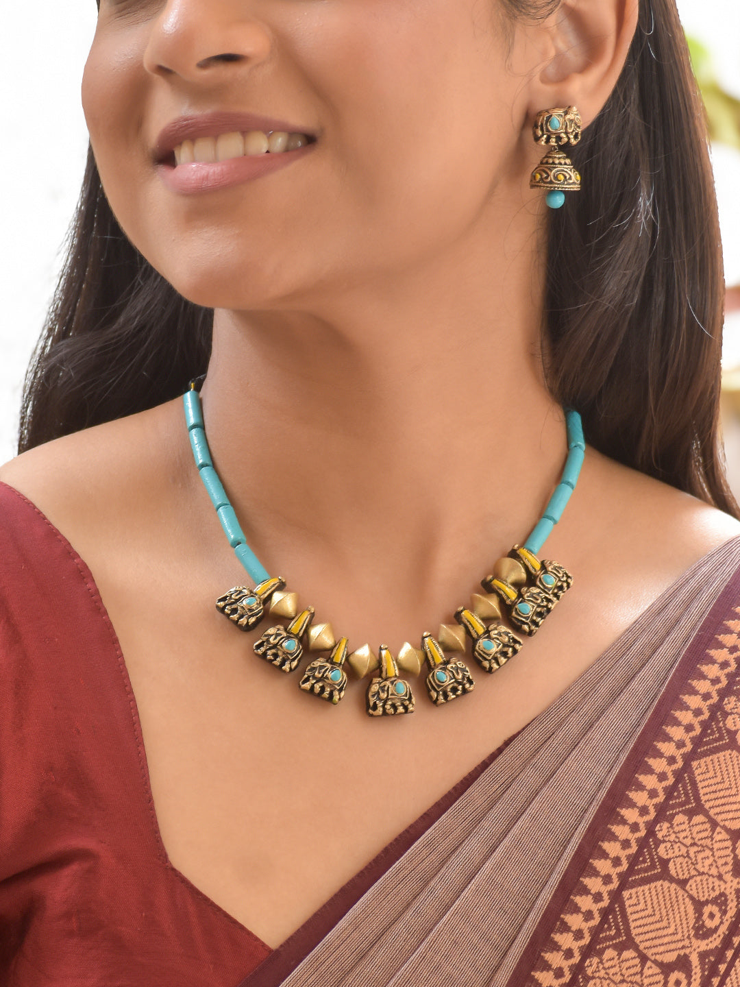 Terracotta Cylindrical Beaded Necklace with Gold Floral Motifs & Matching Earrings
