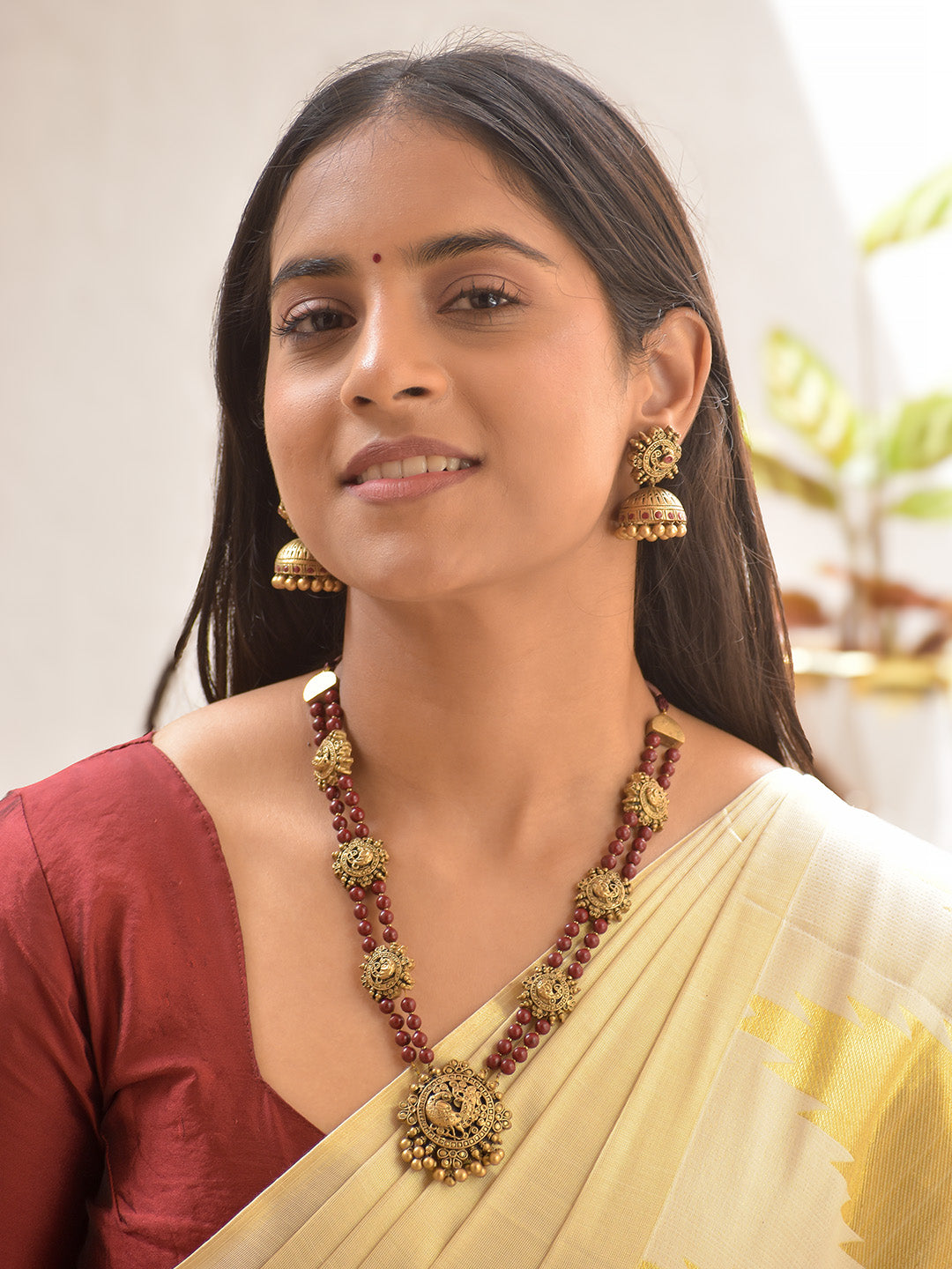 Terracotta Dual-Layer Beaded Necklace Set with Antique Peacock Motifs