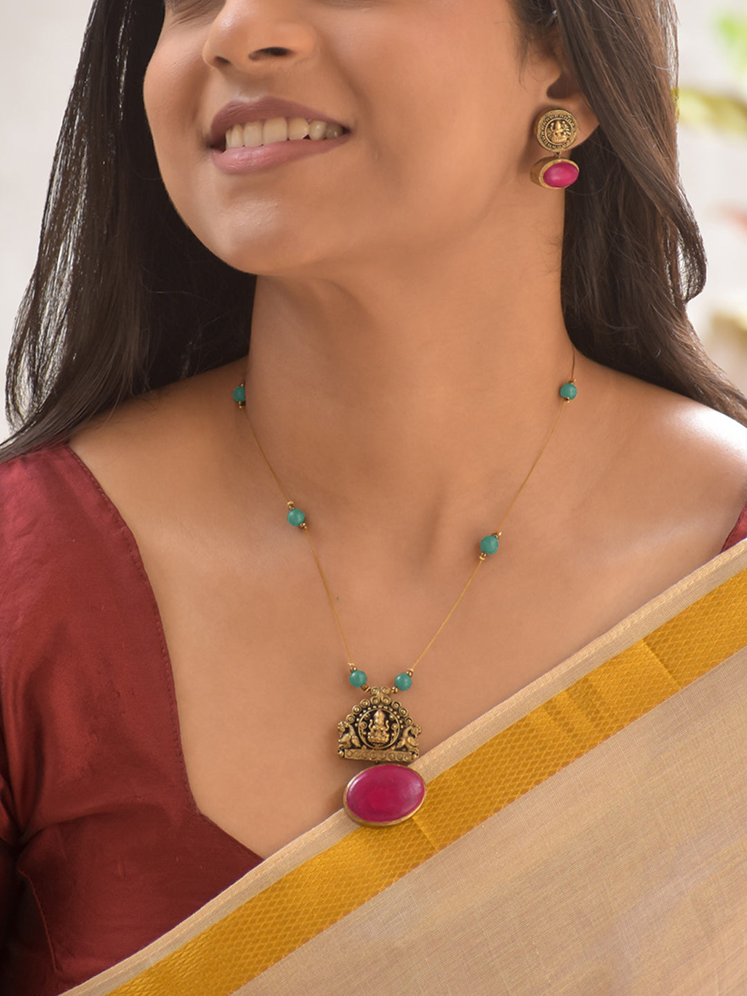 Terracotta Lakshmi Temple Pendant Necklace Set with Blue Beads and Ruby Accents
