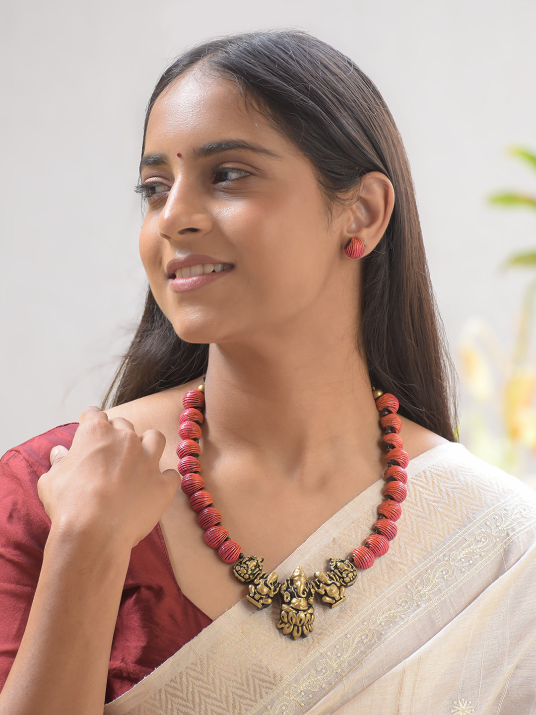 Aruna Ganapati — Ombre Shades of Orange Flower Petal Inspired Antique Gold Ganesha Engraved Pendant Handmade Terracotta Necklace Set