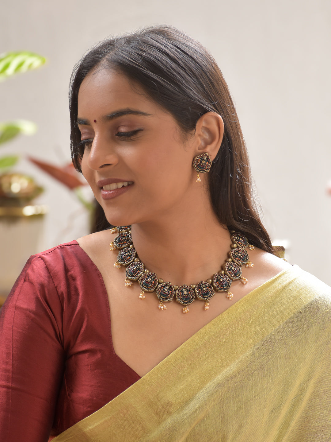 Terracotta Antique Gold Lakshmi Motif Necklace with Bead Drops & Earrings