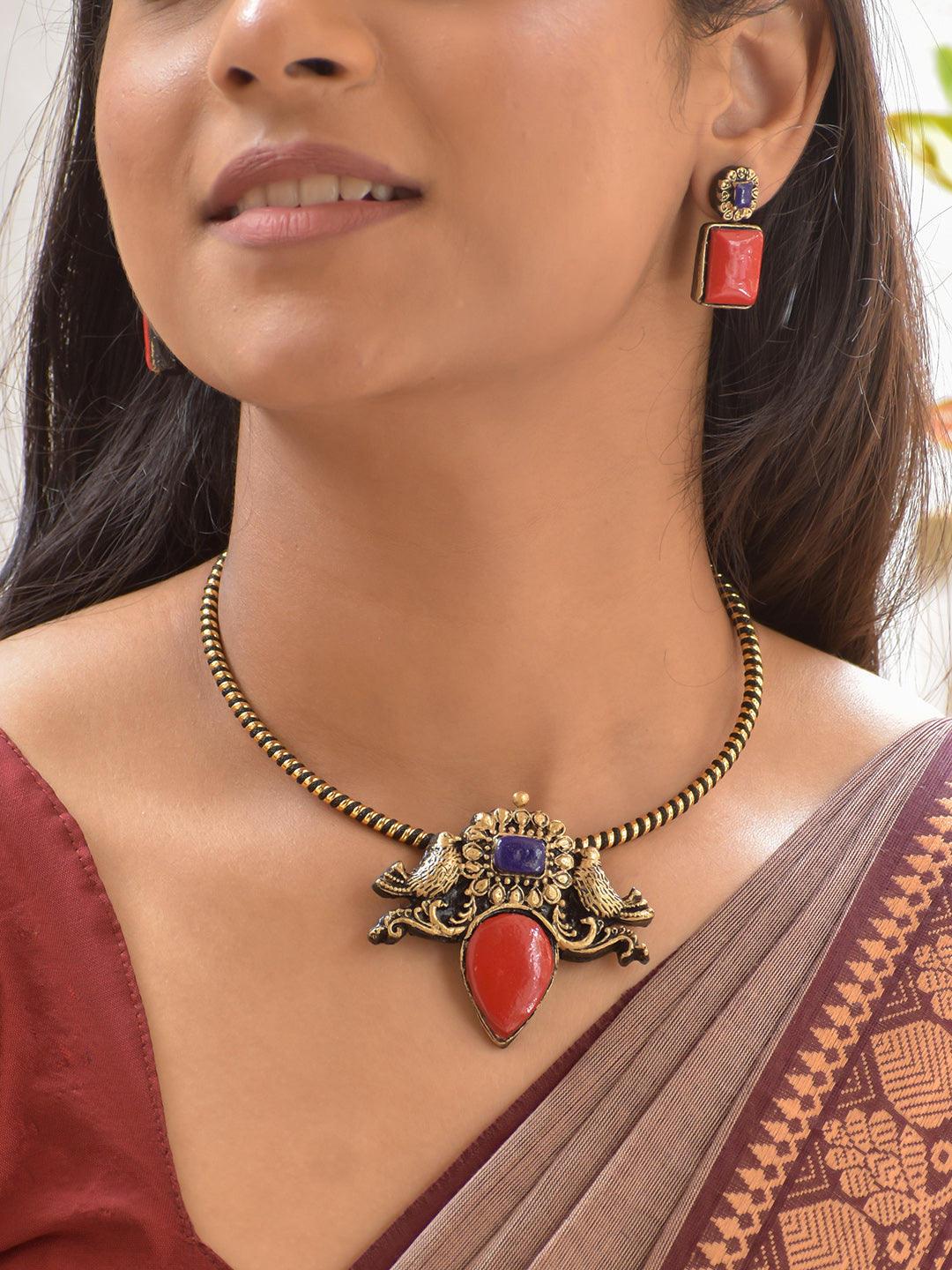 Terracotta Pigeon Pendant Necklace with Red & Blue Accents