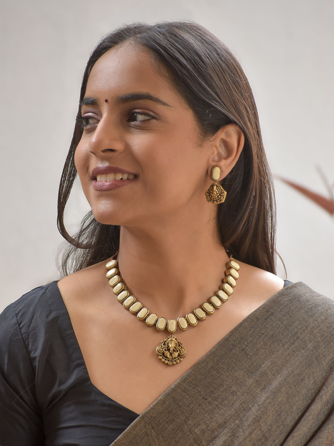 Terracotta White Oval Bead Necklace with Ganesha Pendant & Earrings