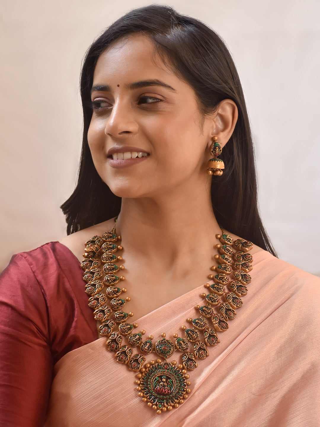 Handcrafted Ganesha Motif Lakshmi Pendant Terracotta Jewellery Set in Antique Gold, Green & Red