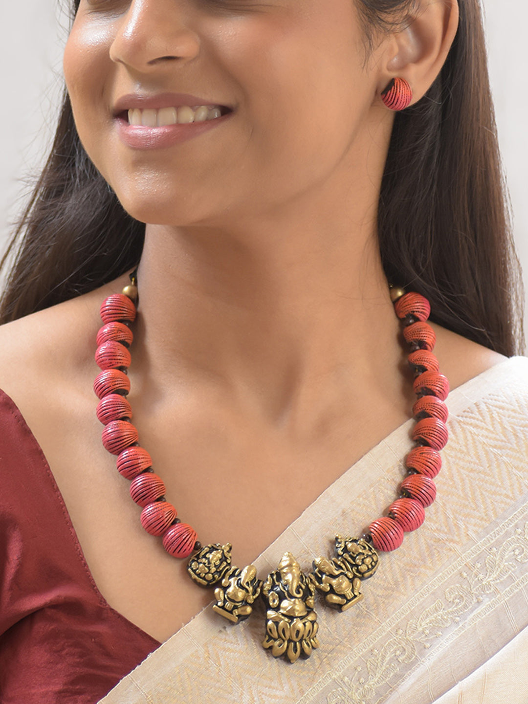 Aruna Ganapati — Ombre Shades of Orange Flower Petal Inspired Antique Gold Ganesha Engraved Pendant Handmade Terracotta Necklace Set