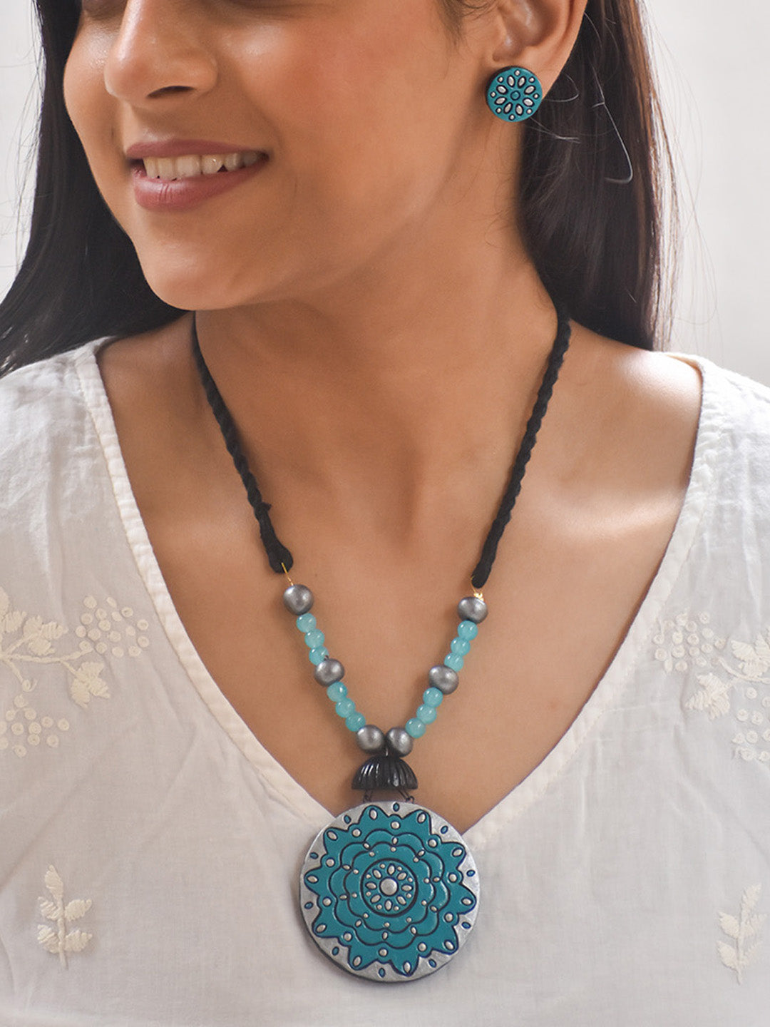 Handcrafted Terracotta Medallion Necklace Set with Blue Floral Design and Matching Studs