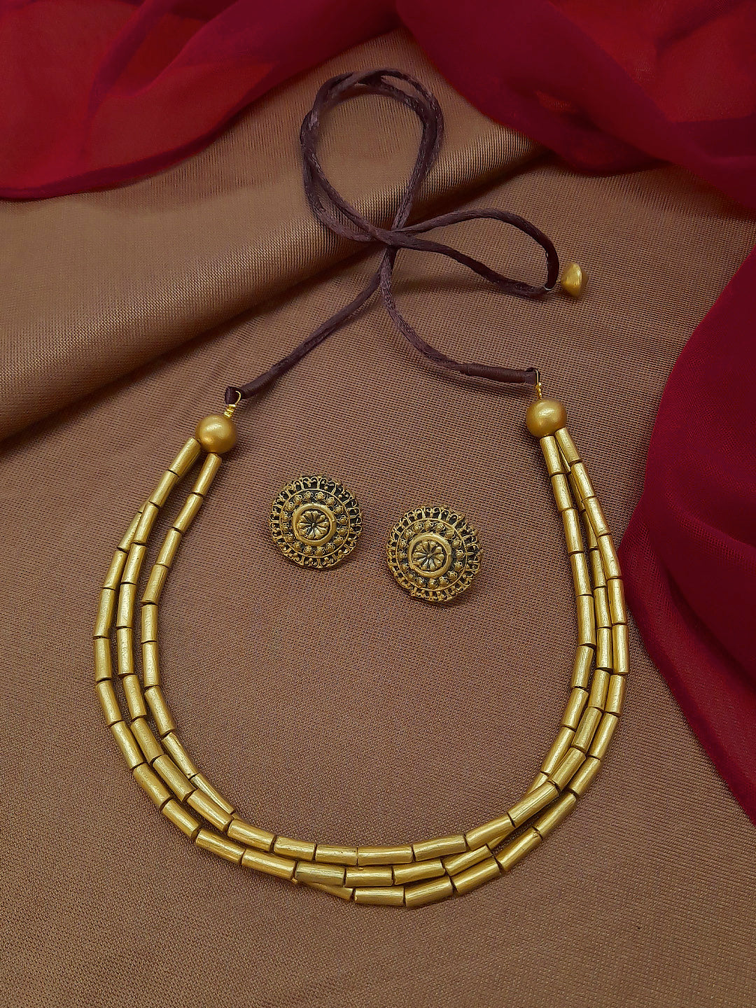 Dhara Vasudha — Antique Gold Toned Multilayered Tube Shape Beads Terracotta Choker Necklace Set