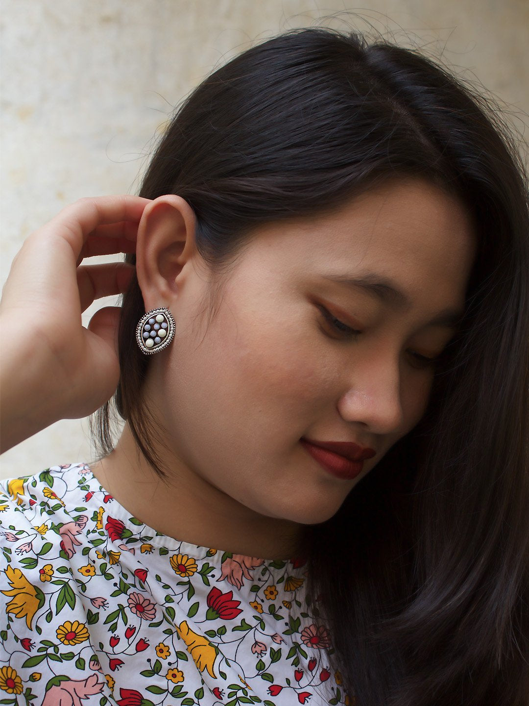 Eye Design Beige Stud With Stones Earring