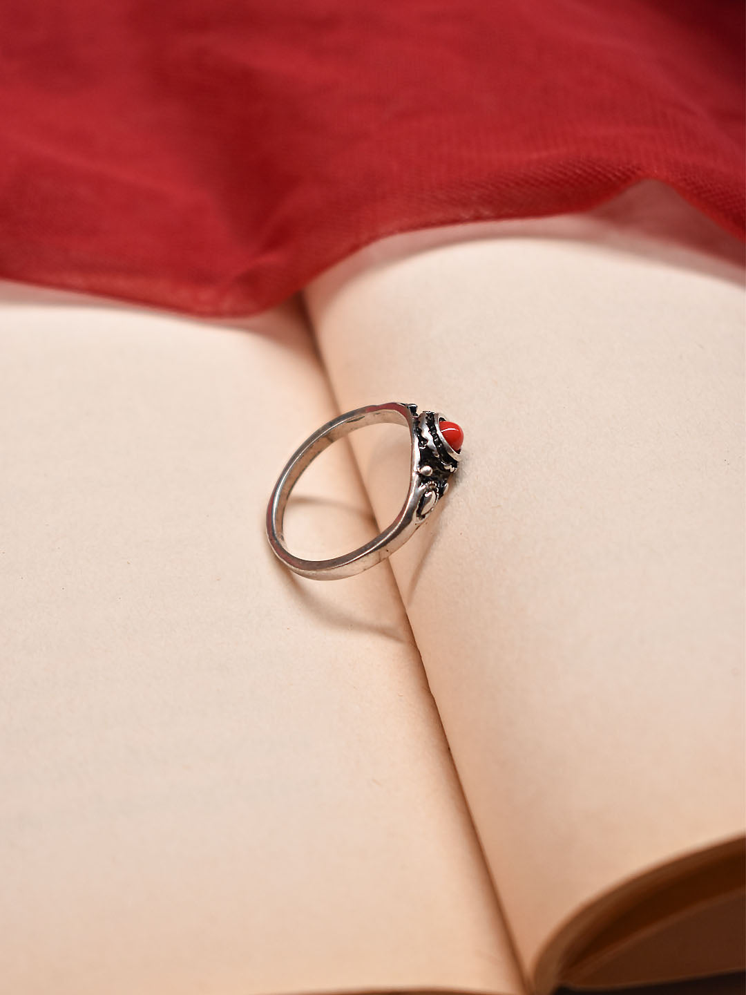 Aana Oxidised Silver Plated Geometric Design Red Color Stone Finger Ring