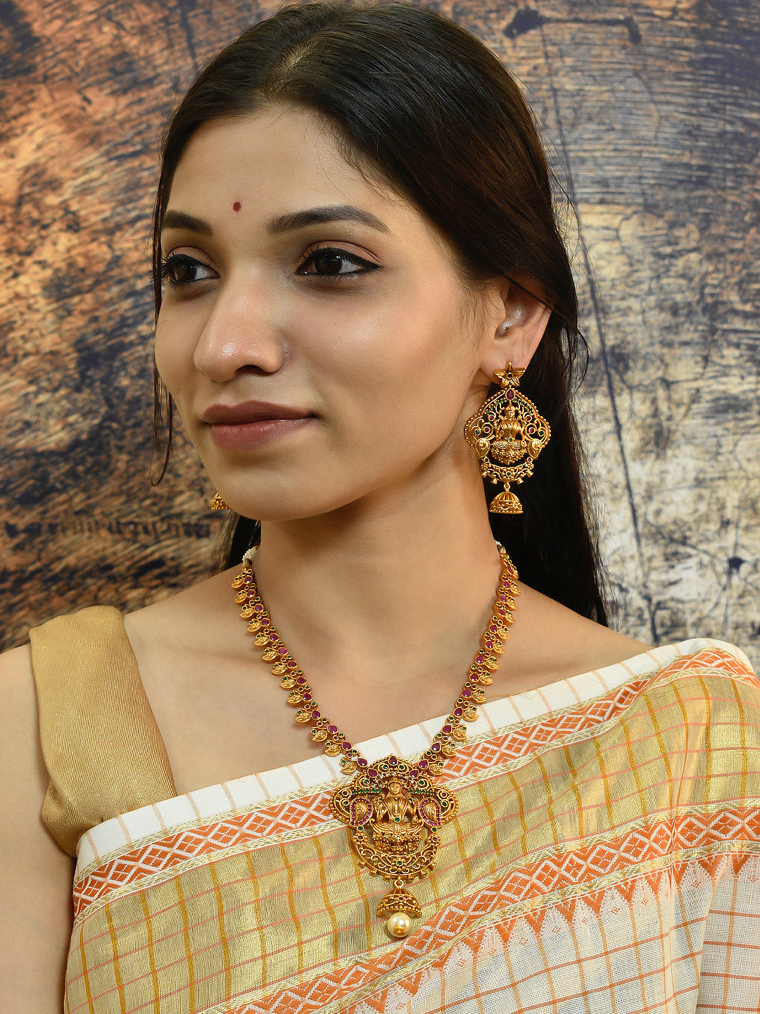 Avismaya Gold Plated Lakshmi Design Medium Haar Necklace Set With Kemp Stones