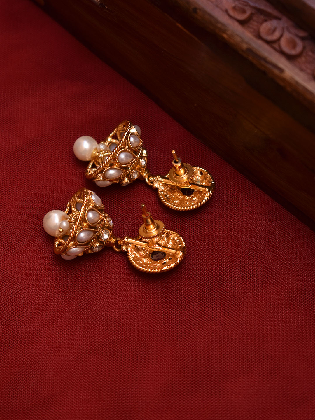 Avismaya Gold Plated Circular Design Stud With Tear Drop Design Studding White Color Pearls Jhumka Earring