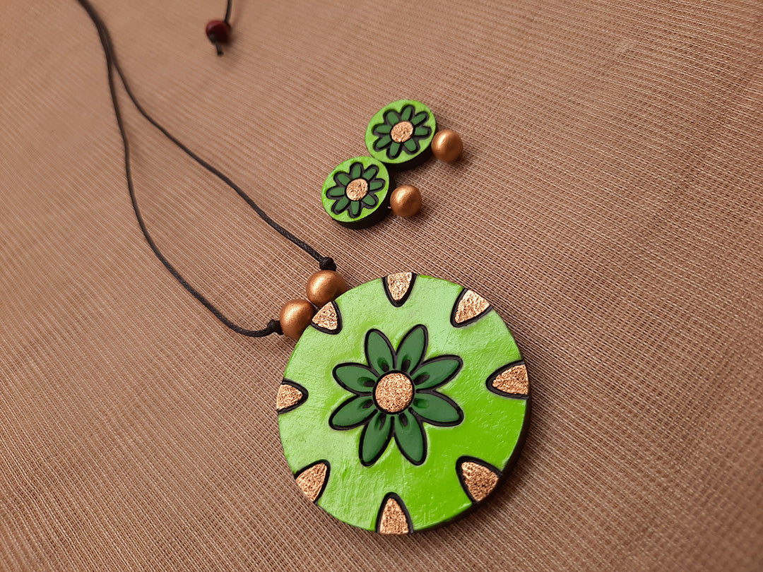Antique Gold Toned Green And Gold Color Circular Shape Floral Design Pendant Terracotta Medium Necklace Set