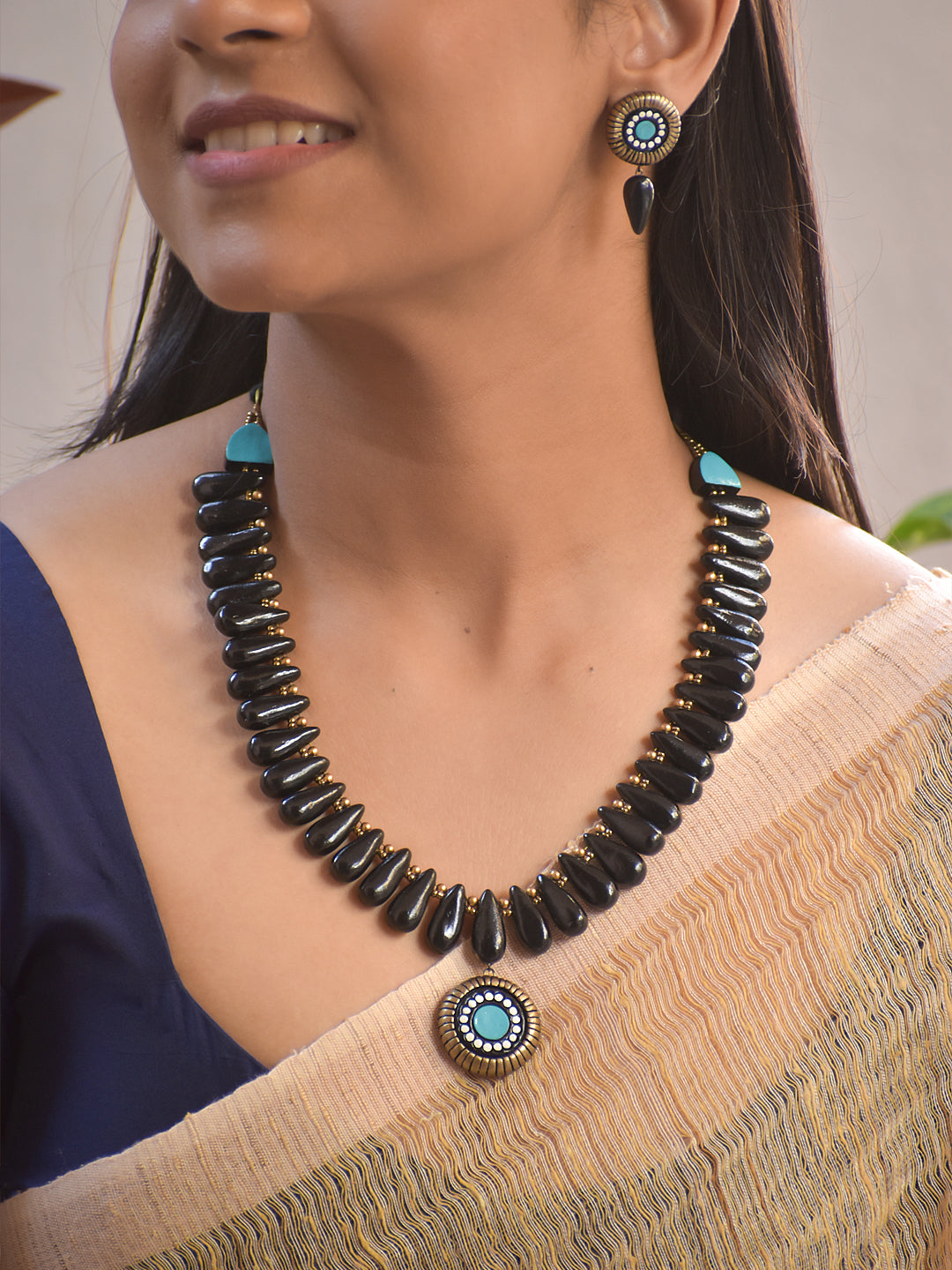 Terracotta Black Beaded Necklace with Turquoise Accent Pendant and Matching Earrings