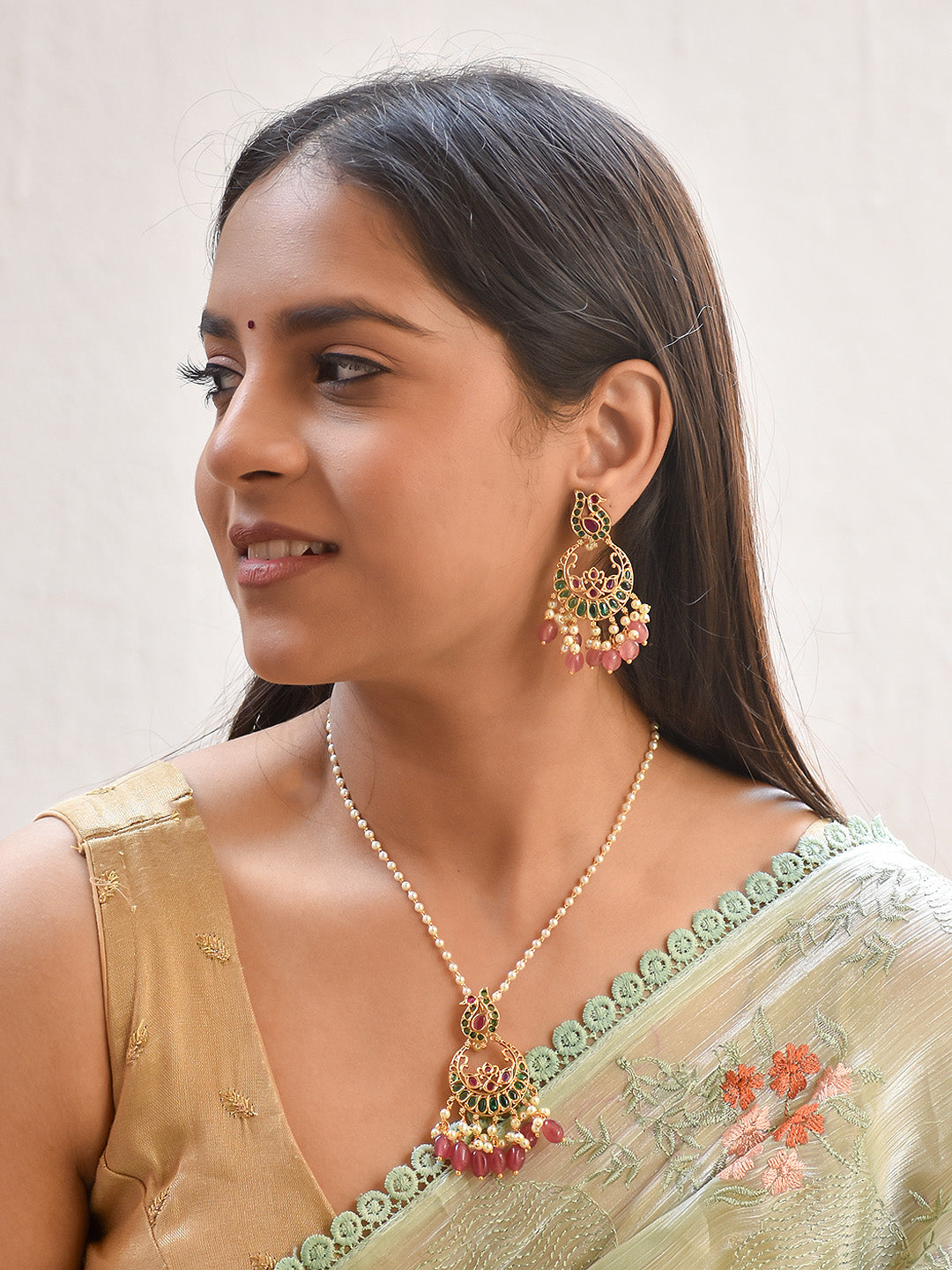 Premium Handcrafted Pearl Kundan Peacock Chandbali Necklace Set in Ruby Pink & Green Onyx Stones