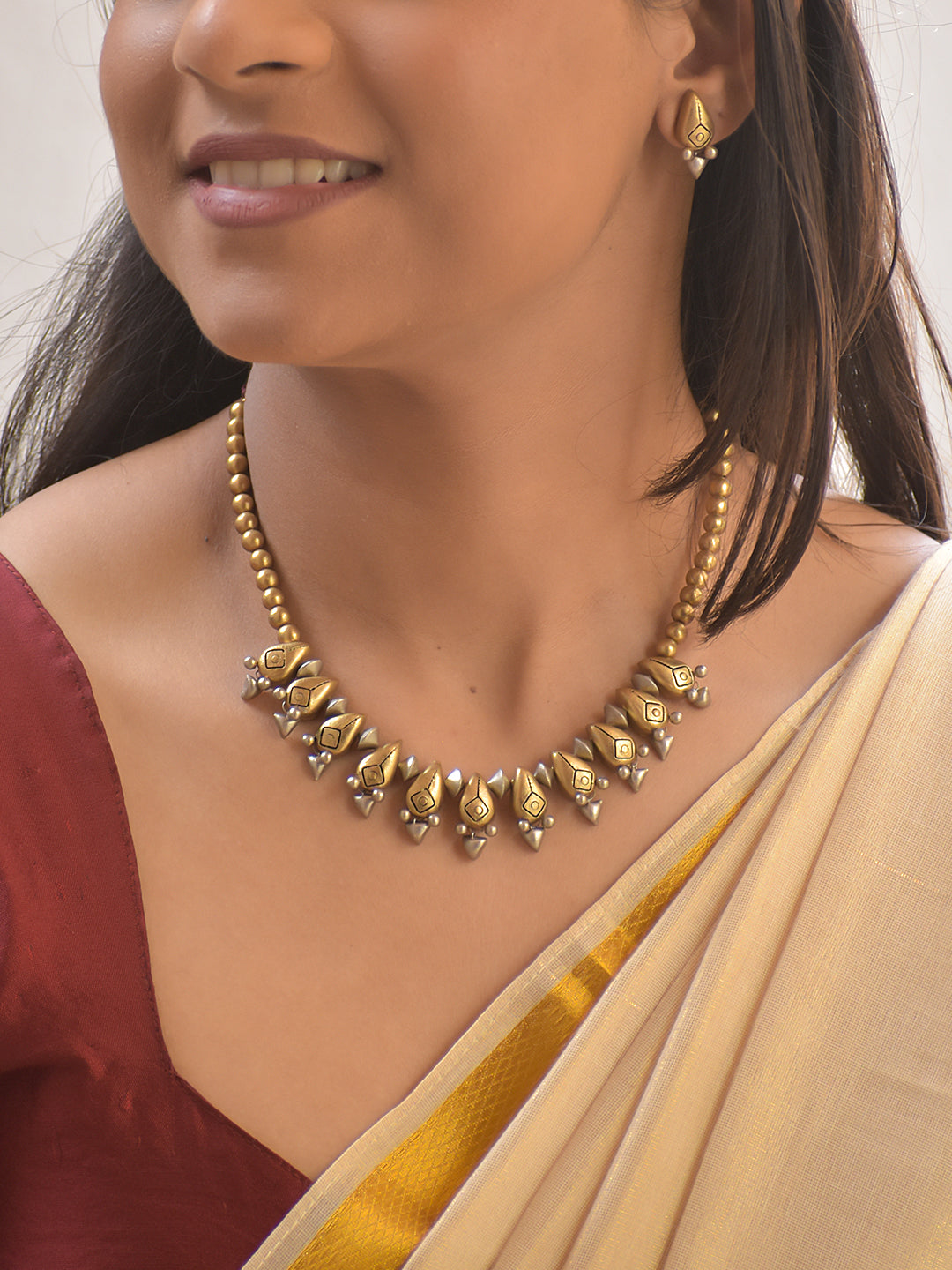 Shilpakriti – Handmade Terracotta Leaf Motif Necklace Set with Matte Gold Beads and Pearl Drops