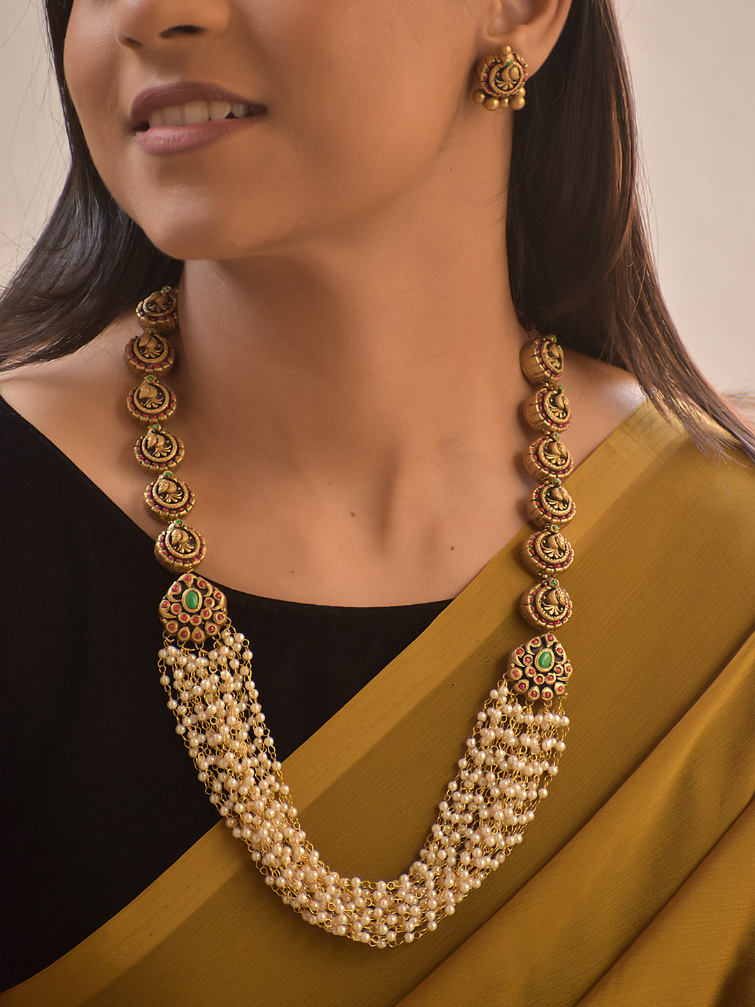 Ratnaveni – Handmade Terracotta Antique Floral Necklace Set with Emerald Detailing and Multi-Layer Pearl Strings