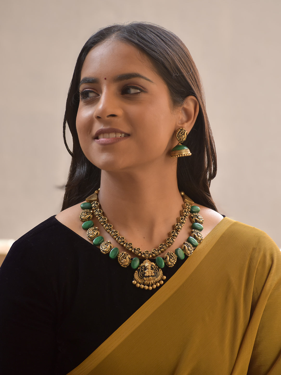 Shrilakshya – Handmade Terracotta Lakshmi Necklace Set with Antique Gold Motifs and Emerald-Green Beads