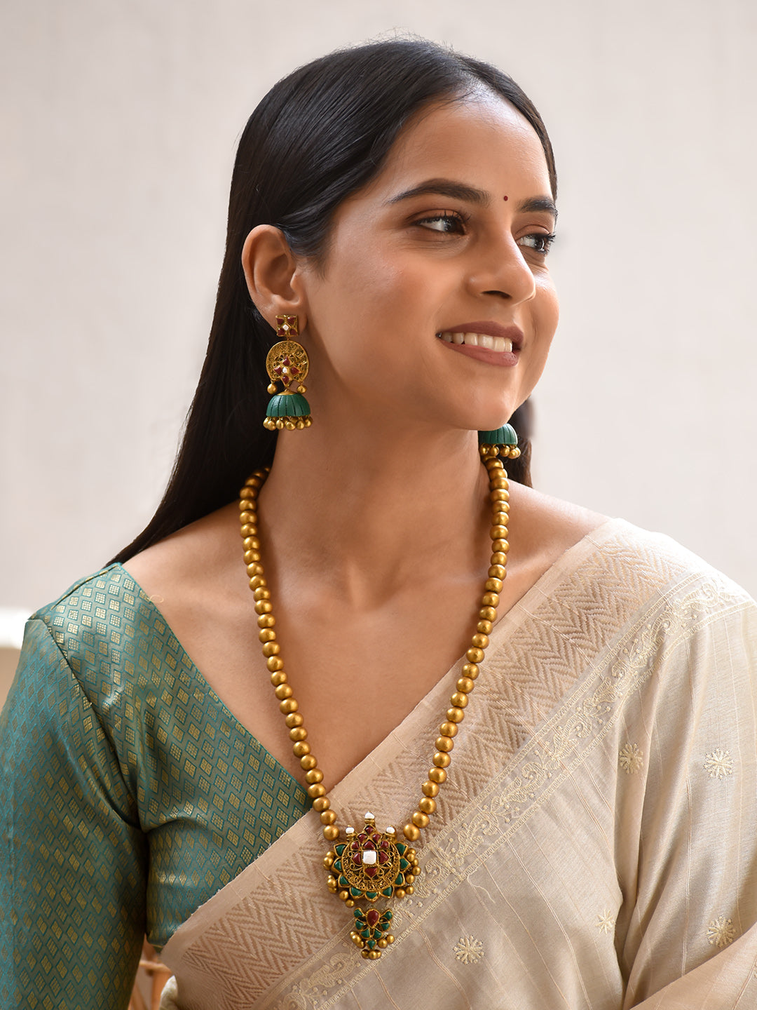 Terracotta Antique Gold Bead Necklace with Floral Statement Pendant & Green Jhumka Earrings