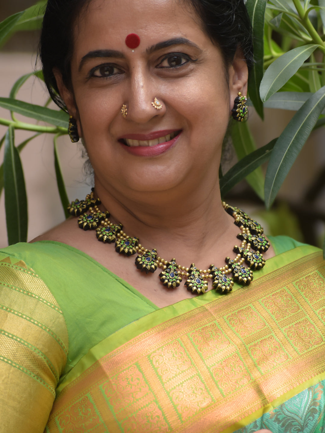 Handcrafted Terracotta Gold Antique Peacock Motif Pearl Necklace Set in Green and Blue