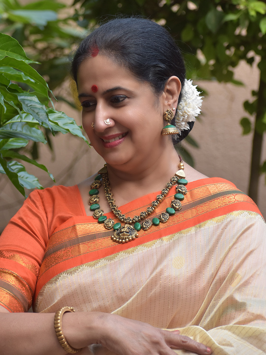 Shrilakshya – Handmade Terracotta Lakshmi Necklace Set with Antique Gold Motifs and Emerald-Green Beads