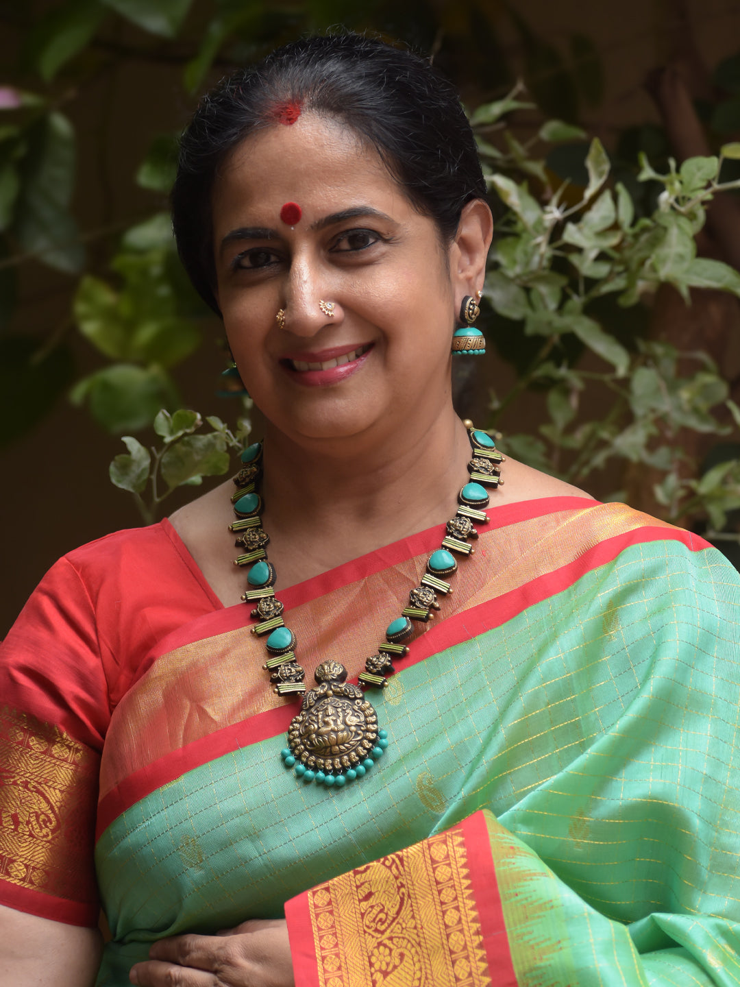 Handcrafted Lakshmi Pendant Oval ShapeTerracotta Jewellery Set in Blue & Antique Gold