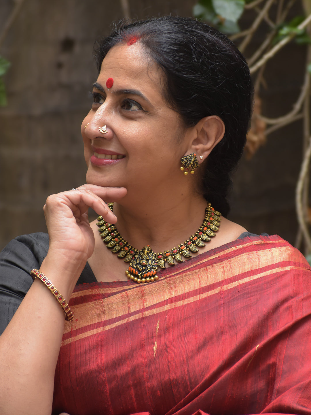 Handcrafted Terracotta Antique Gold Ganesha Design Jewellery Set in Red & Orange Accents