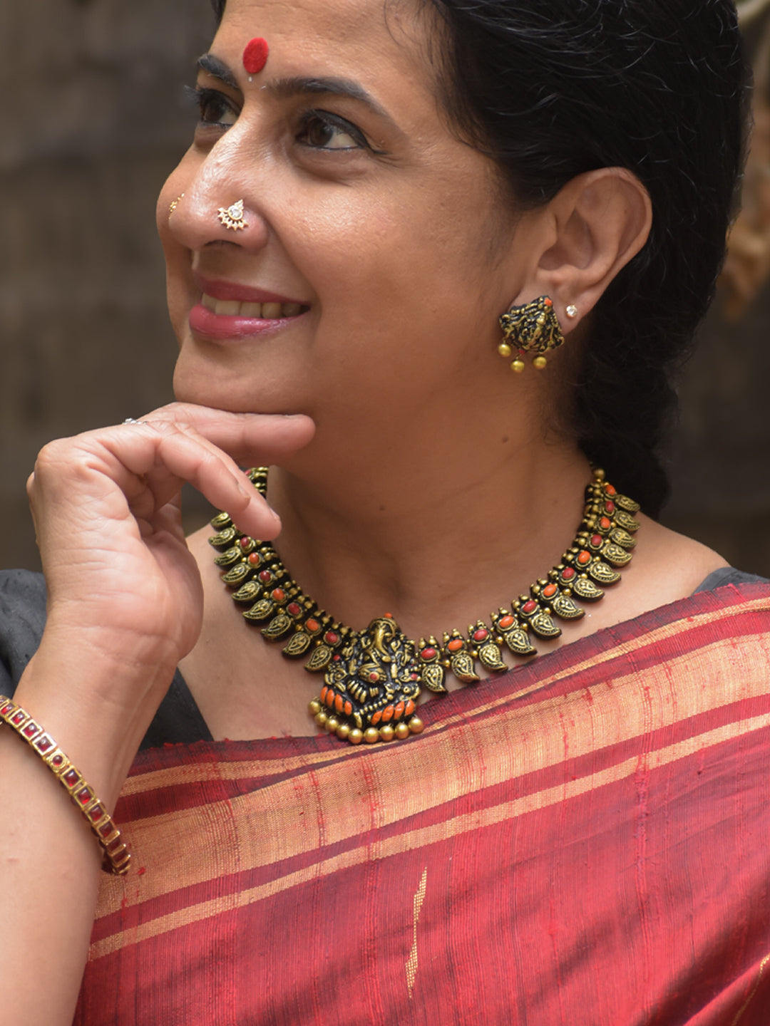 Handcrafted Terracotta Antique Gold Ganesha Design Jewellery Set in Red & Orange Accents