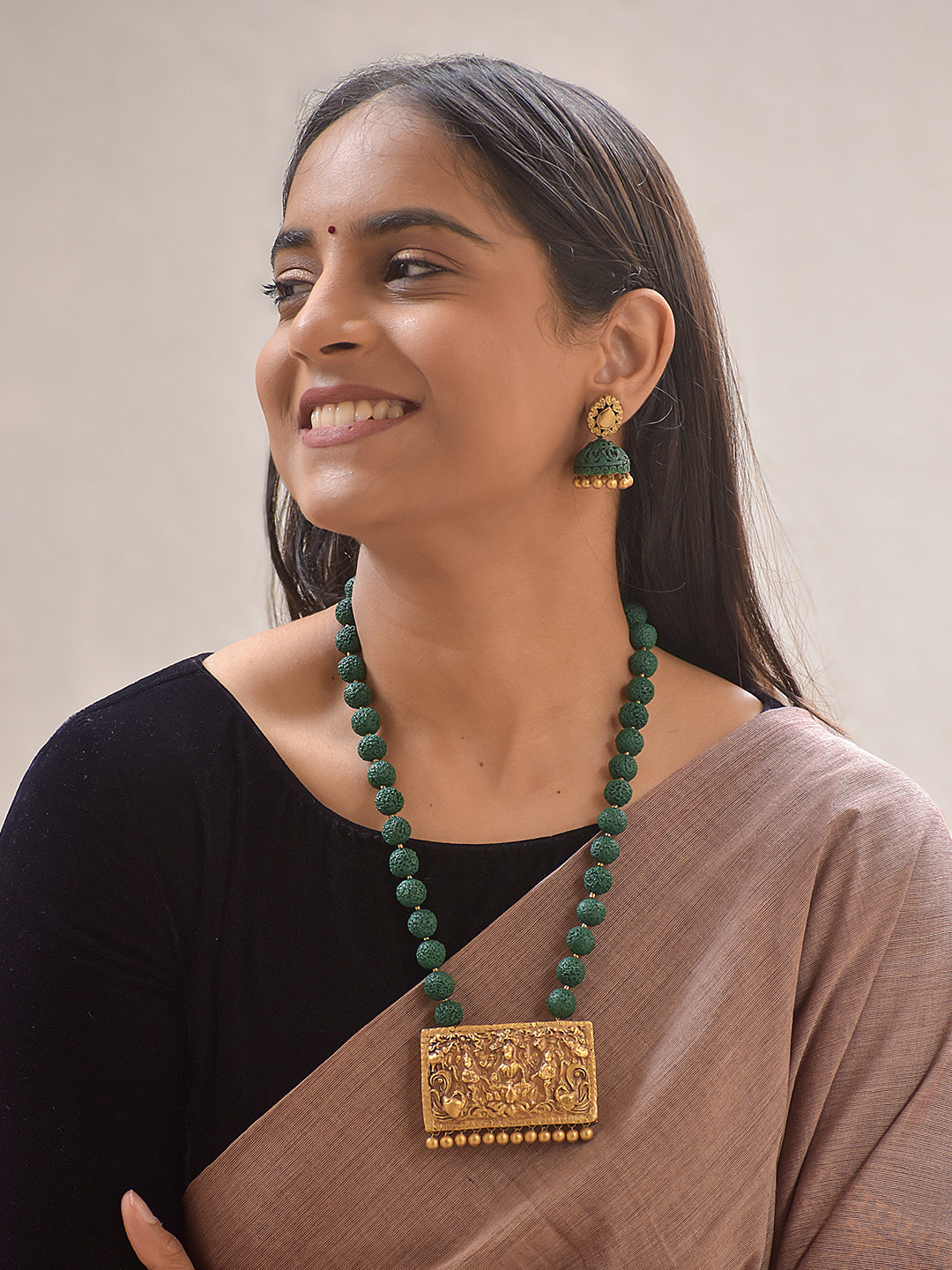 Divyakriti – Handmade Terracotta Temple Pendant Necklace Set with Green Textured Beads and Antique Engraved Jhumka Earrings