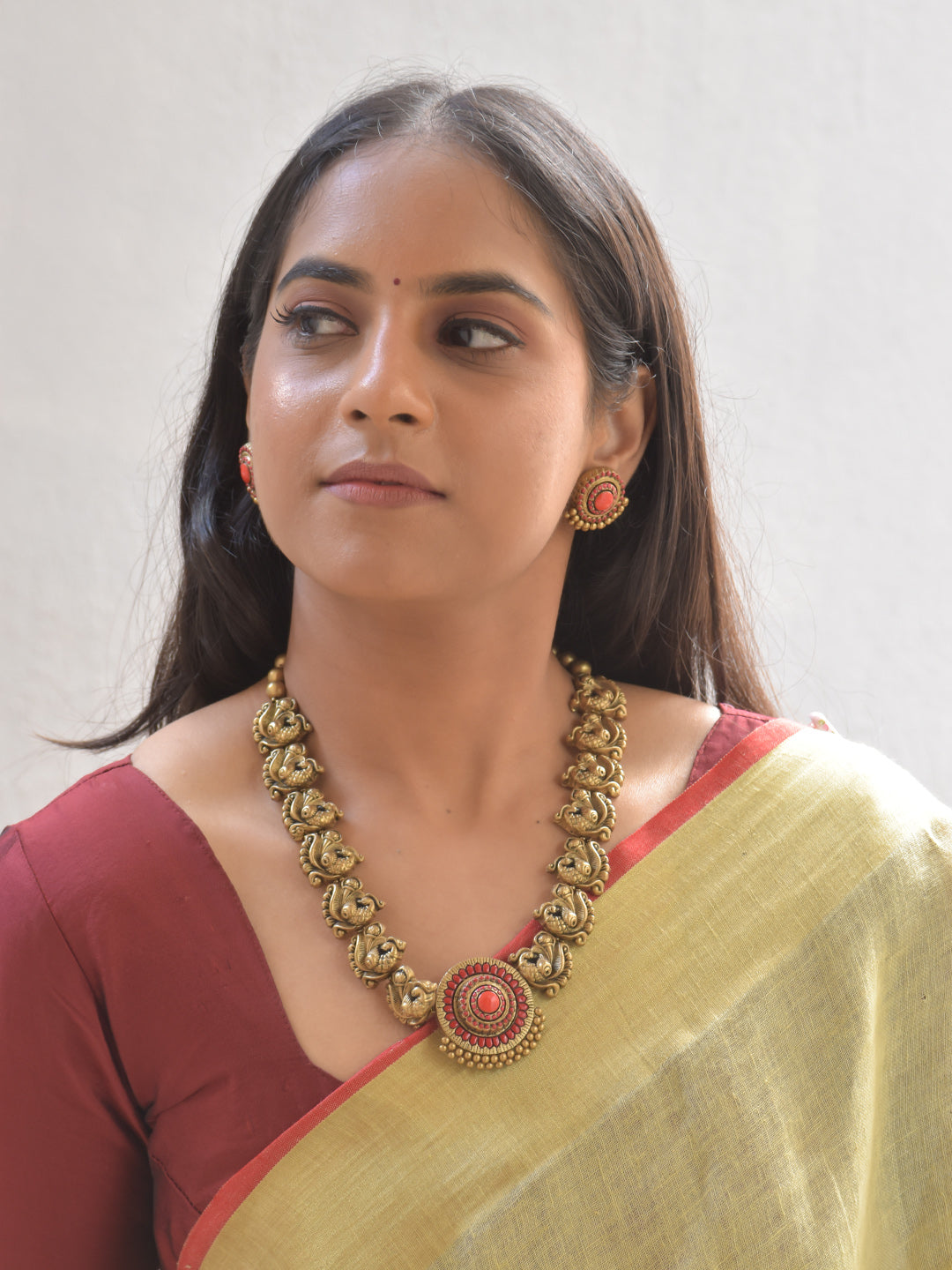 Aarunya Terracotta Peacock Motif Necklace Set With Studs