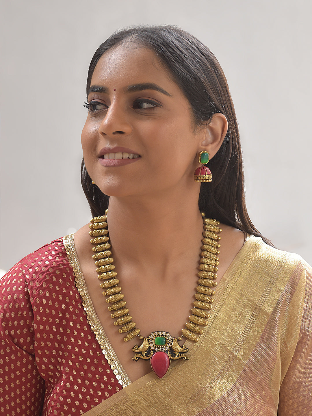 Terracotta Twin-Peacock Pendant Necklace with Pink-Green Stone Design With Jhumkas