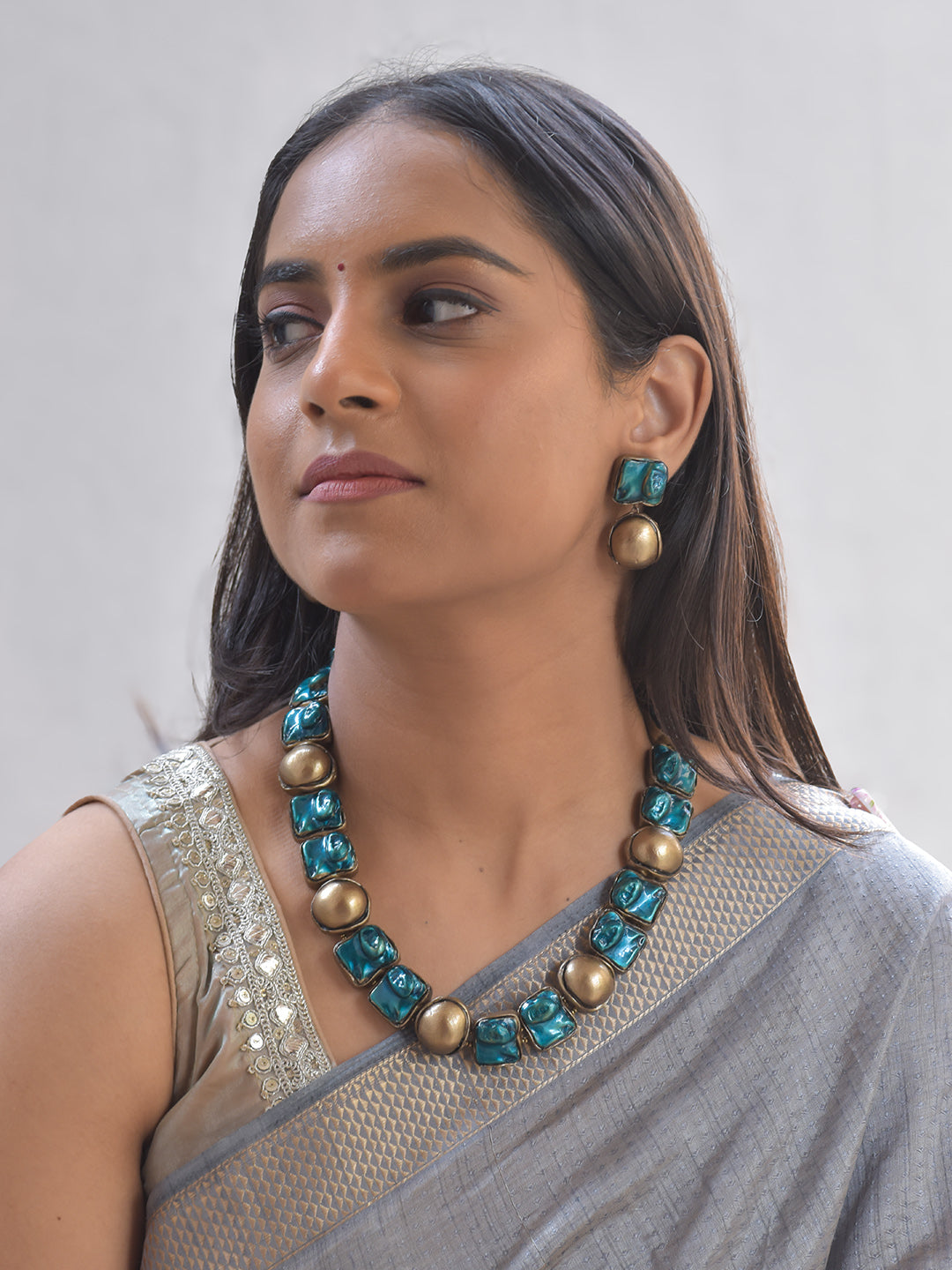 Terracotta Azurea Glossy square teal-blue terracotta blocks paired with Earrings