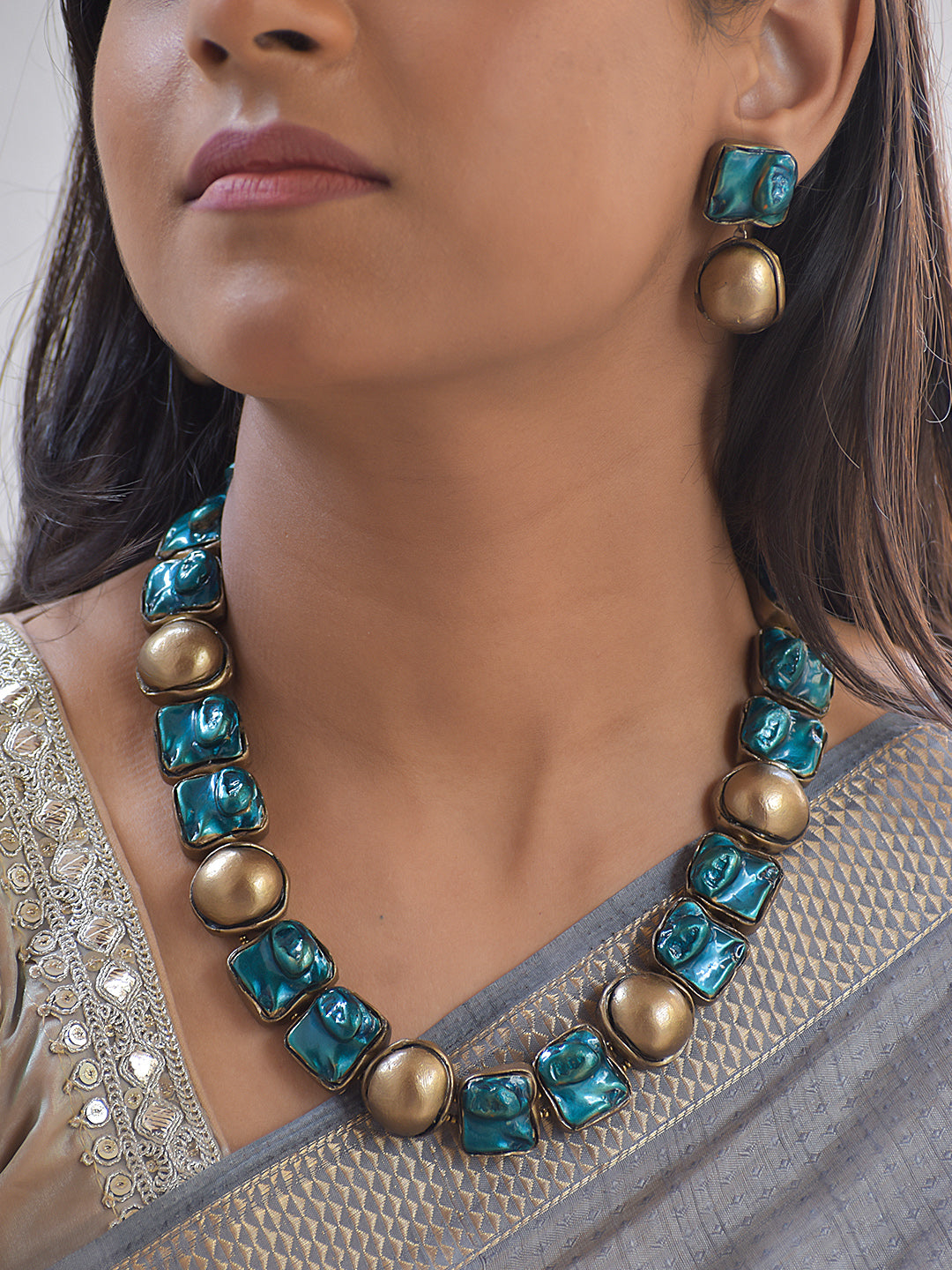 Terracotta Azurea Glossy square teal-blue terracotta blocks paired with Earrings