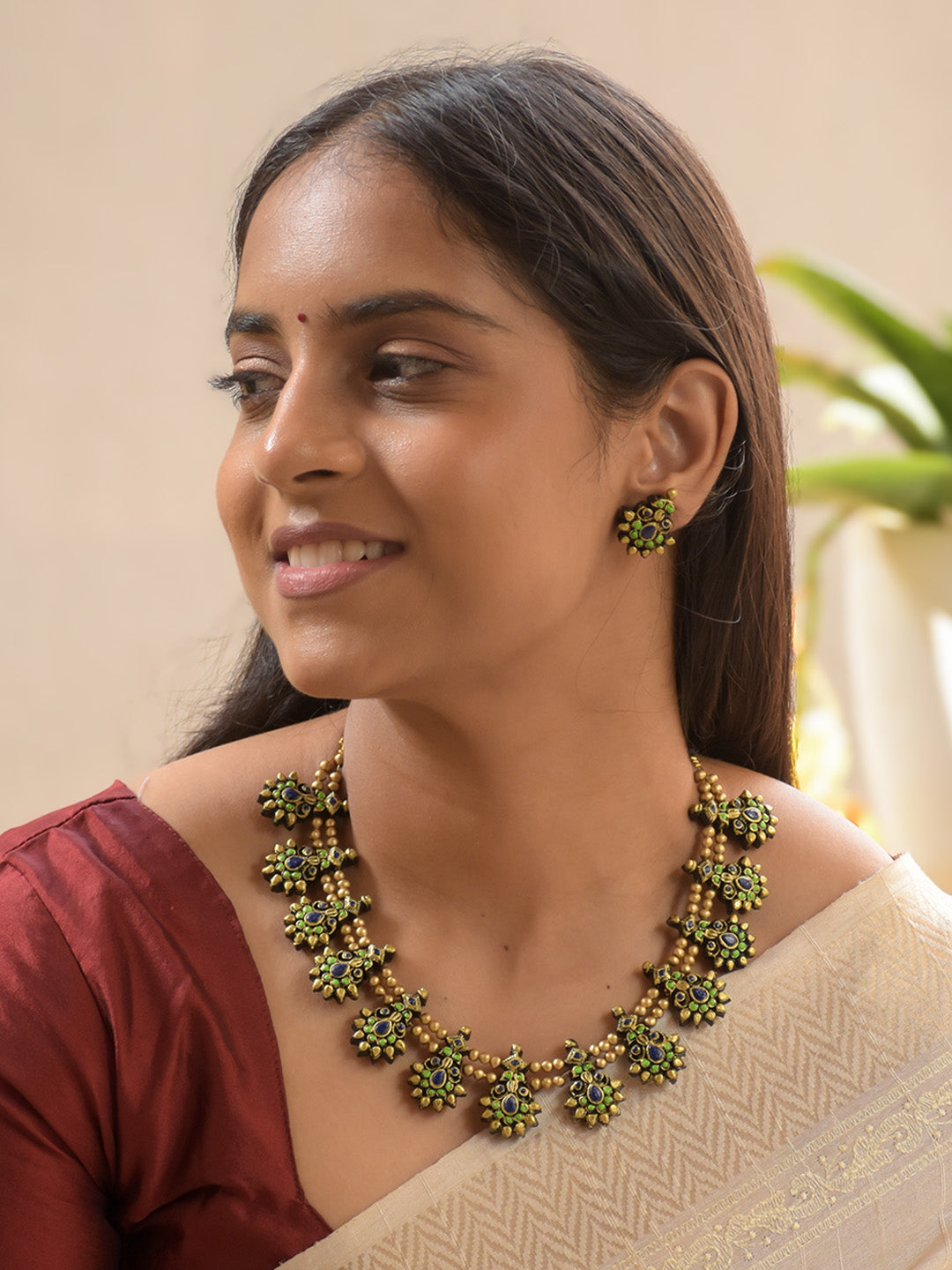 Handcrafted Terracotta Gold Antique Peacock Motif Pearl Necklace Set in Green and Blue