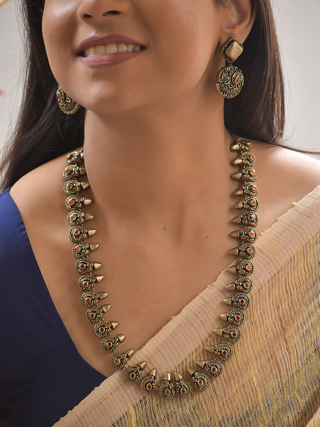 Terracotta Peacock Cone Motif Necklace with Red Stone Design Accents With Flat Earrings