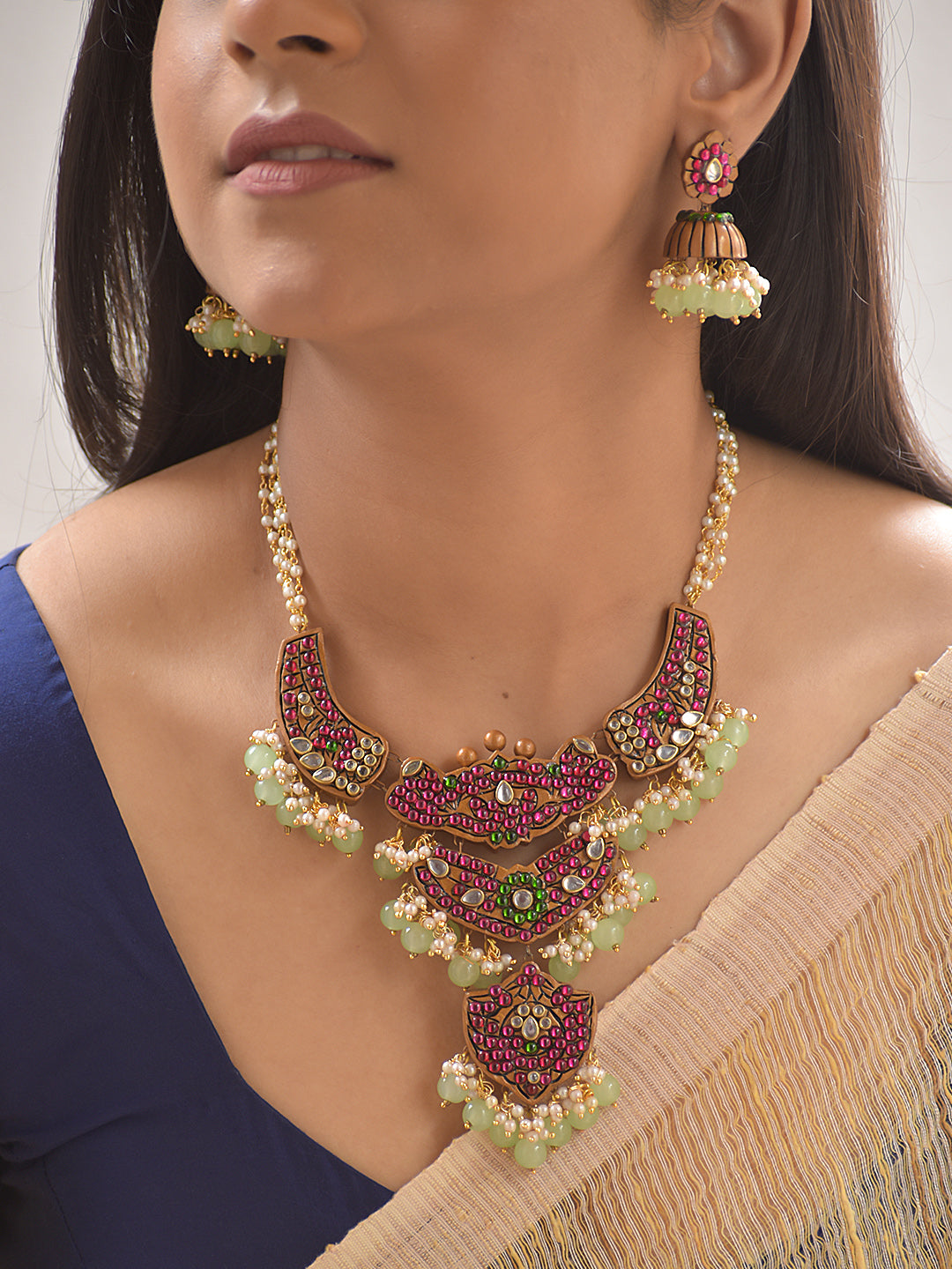 Terracotta Red Kundan-Style Floral Statement Necklace with Green Bead Drops With Jhumkas