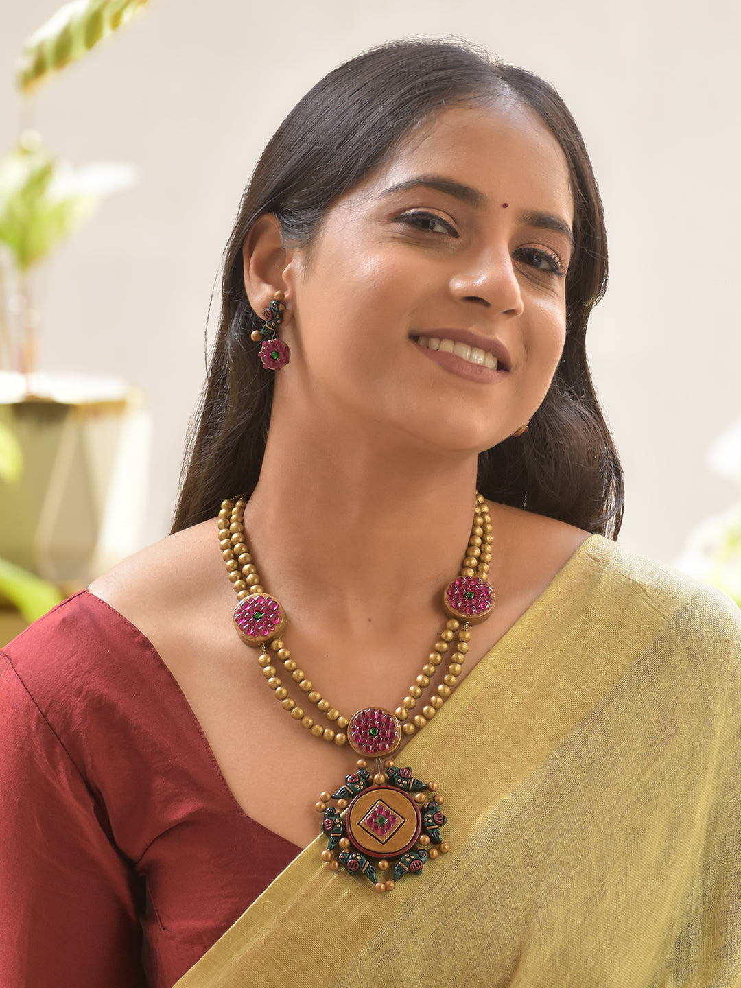 Royal Bloom Terracotta Red Kundan Necklace Set with Peacock Pendant – Antique Gold & Red Earrings