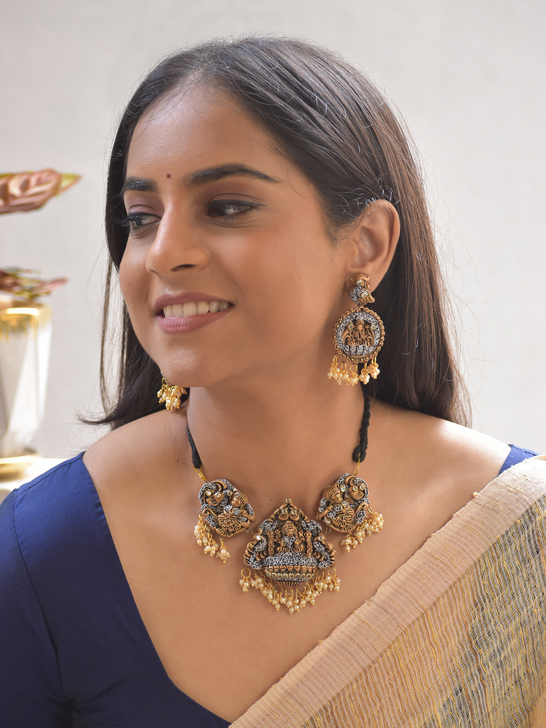 Terracotta Temple Deity Lakshmi Motif Antique Gold Necklace with Pearl Drops With Jhumkas