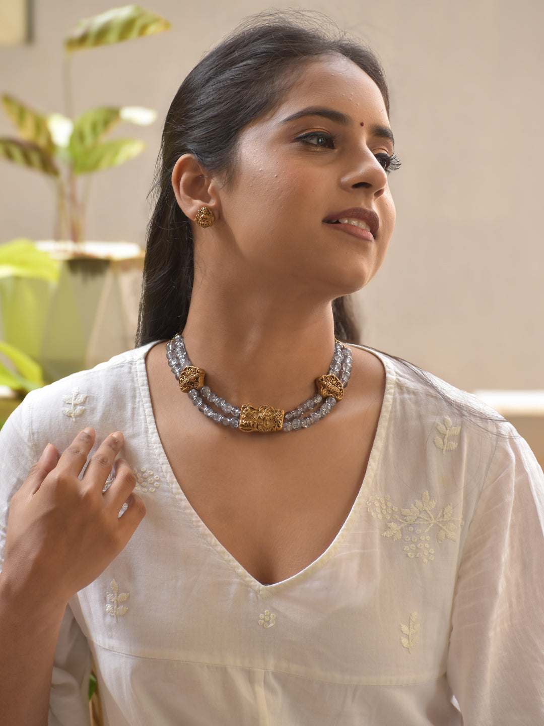 Crystal Beads Twin Strand Terracotta Necklace Set with Antique Gold Tribal Motifs & Stud Earrings