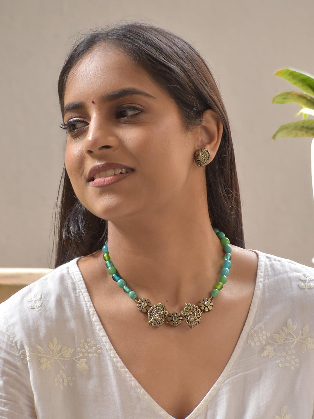 Green Beads Terracotta Necklace Set with Twin Peacock Motif and Floral Accents Stud Earrings