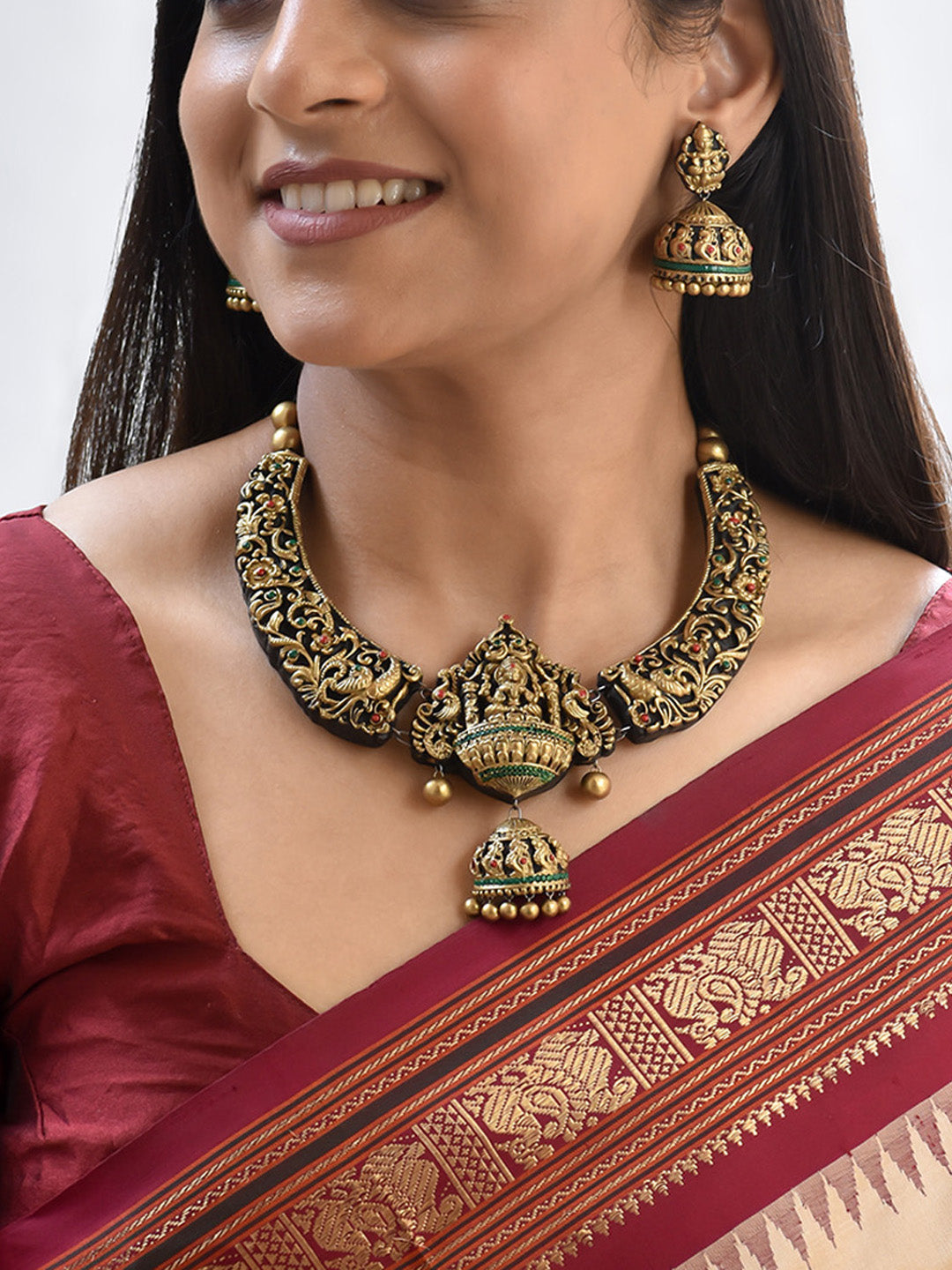 Handcrafted Lakshmi Pendant Temple Jewellery Set in Antique Gold with Red & Green Accents