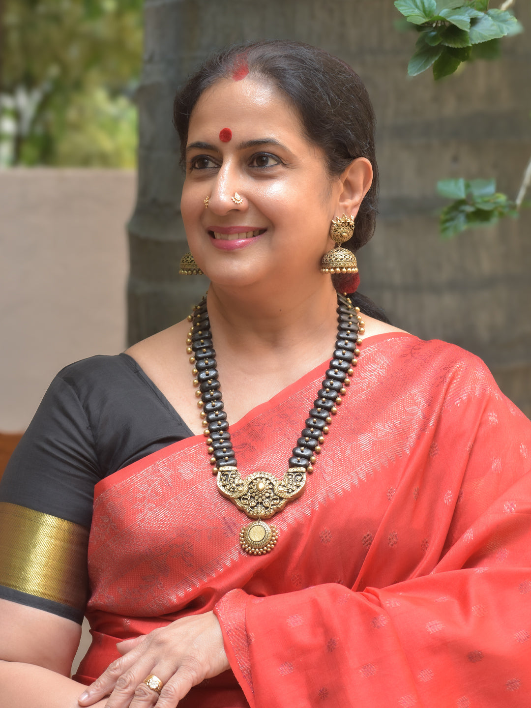 Shringarika – Handmade Terracotta Antique Black–Gold Necklace Set with Intricate Filigree Pendant and Jhumka Earrings