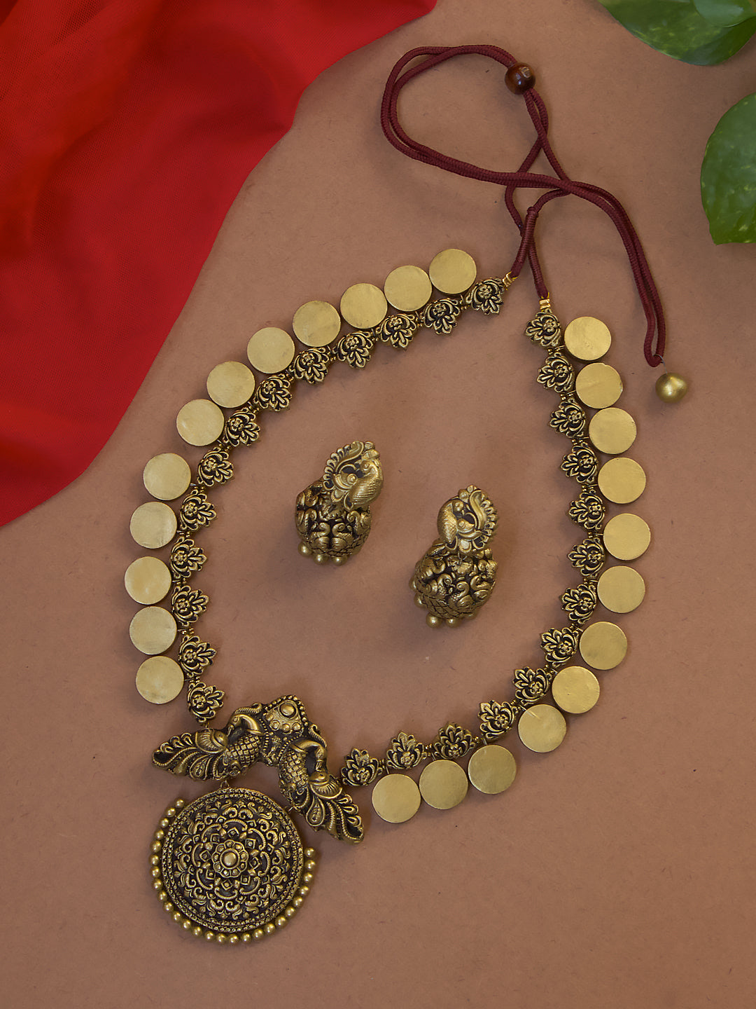 Svarnamayura — Antique Gold Coin Floral Peacock Design Circular Pendant Haram Style Handmade Terracotta Necklace Set