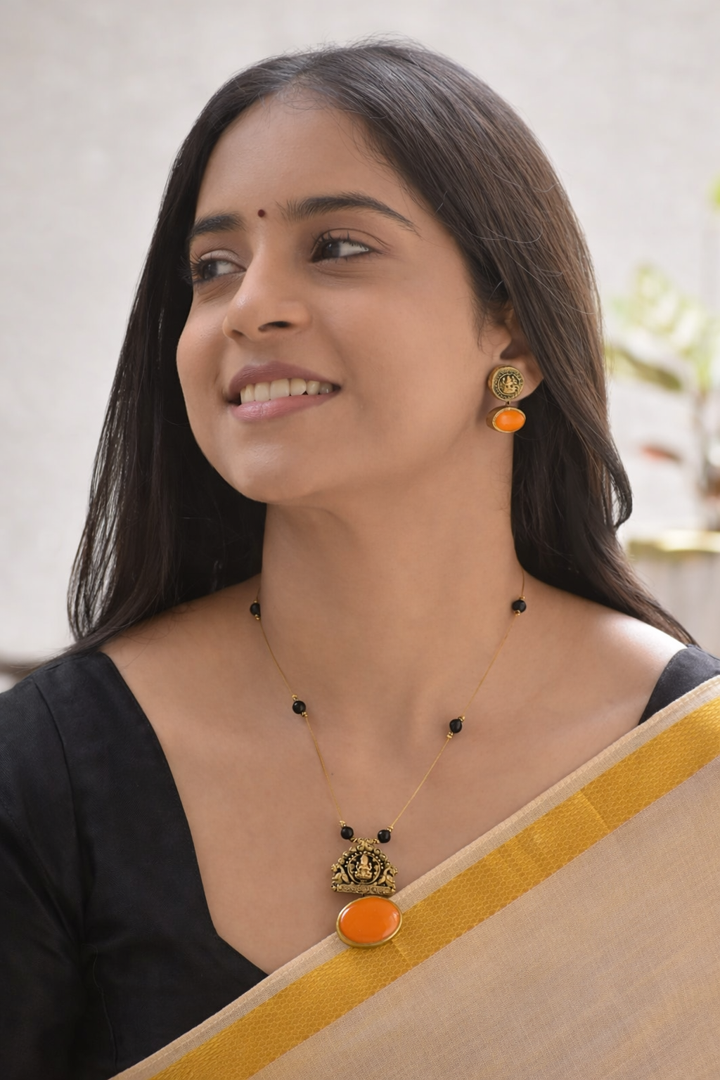 Parvathy — Terracotta Lakshmi Temple Pendant Necklace Set with Black Beads and Bright Orange Stone Highlights