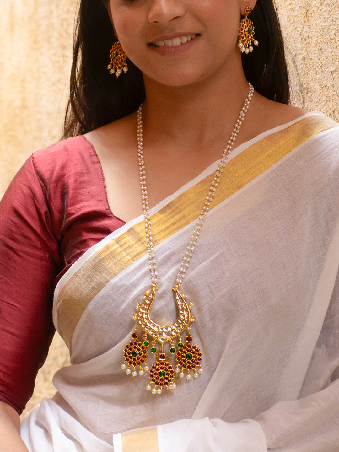 Premium Gold Finish Red and Green Kemp stones Kundan Temple Necklace Pearls Set