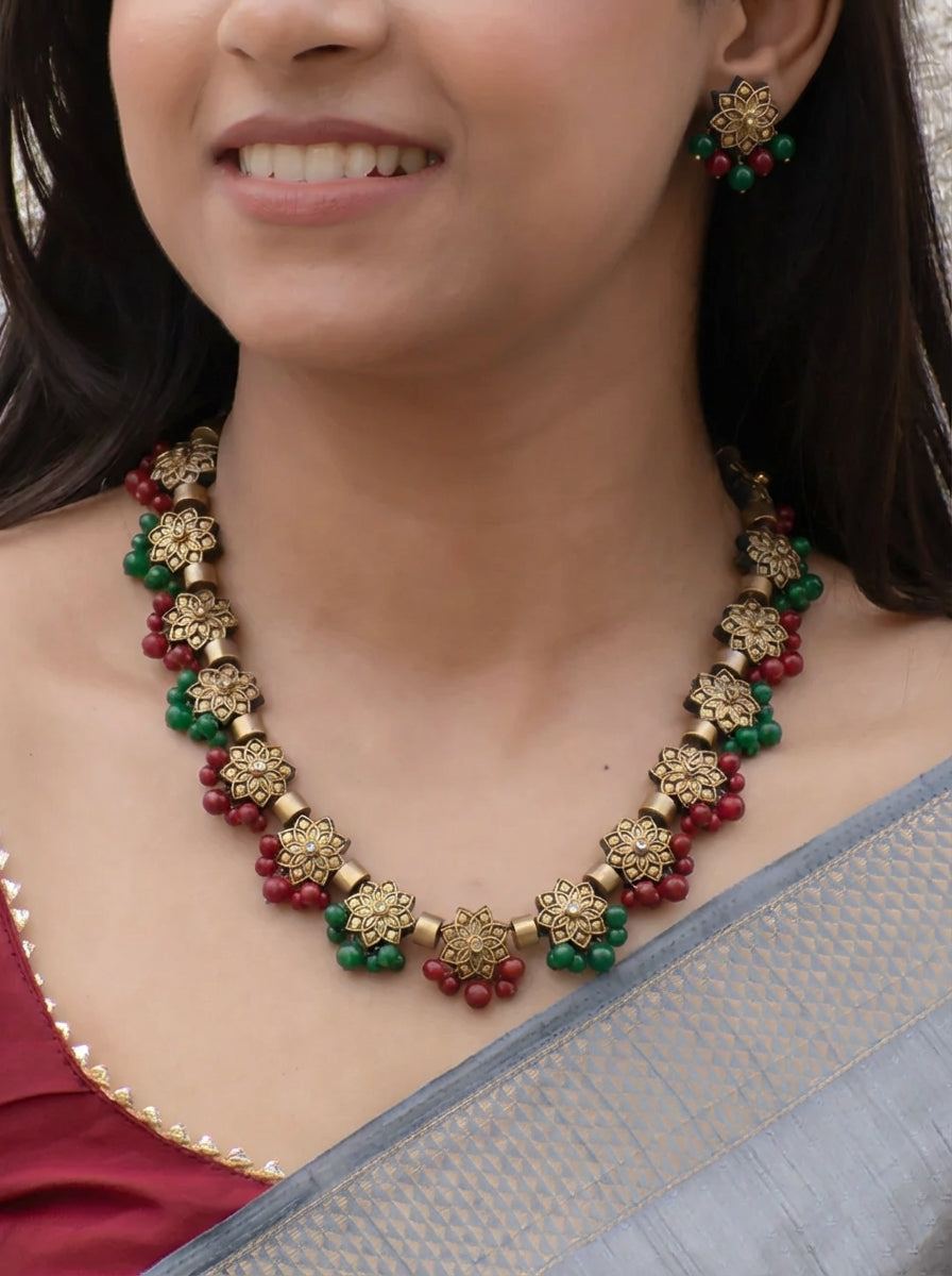 Sreeanjali — Antique Gold Floral Tube Design Maroon/Green Kundan Stone Handmade Terracotta Necklace Set